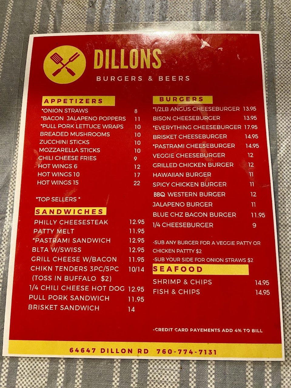 Burger menu with cheeseburgers and wings listed.